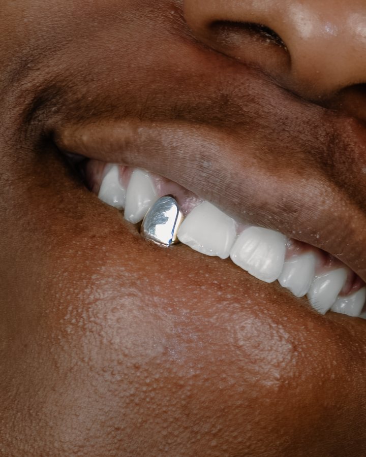 Close-up of a single silver cap